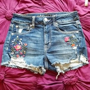 Embroidered destroyed denim shorts, mid rise